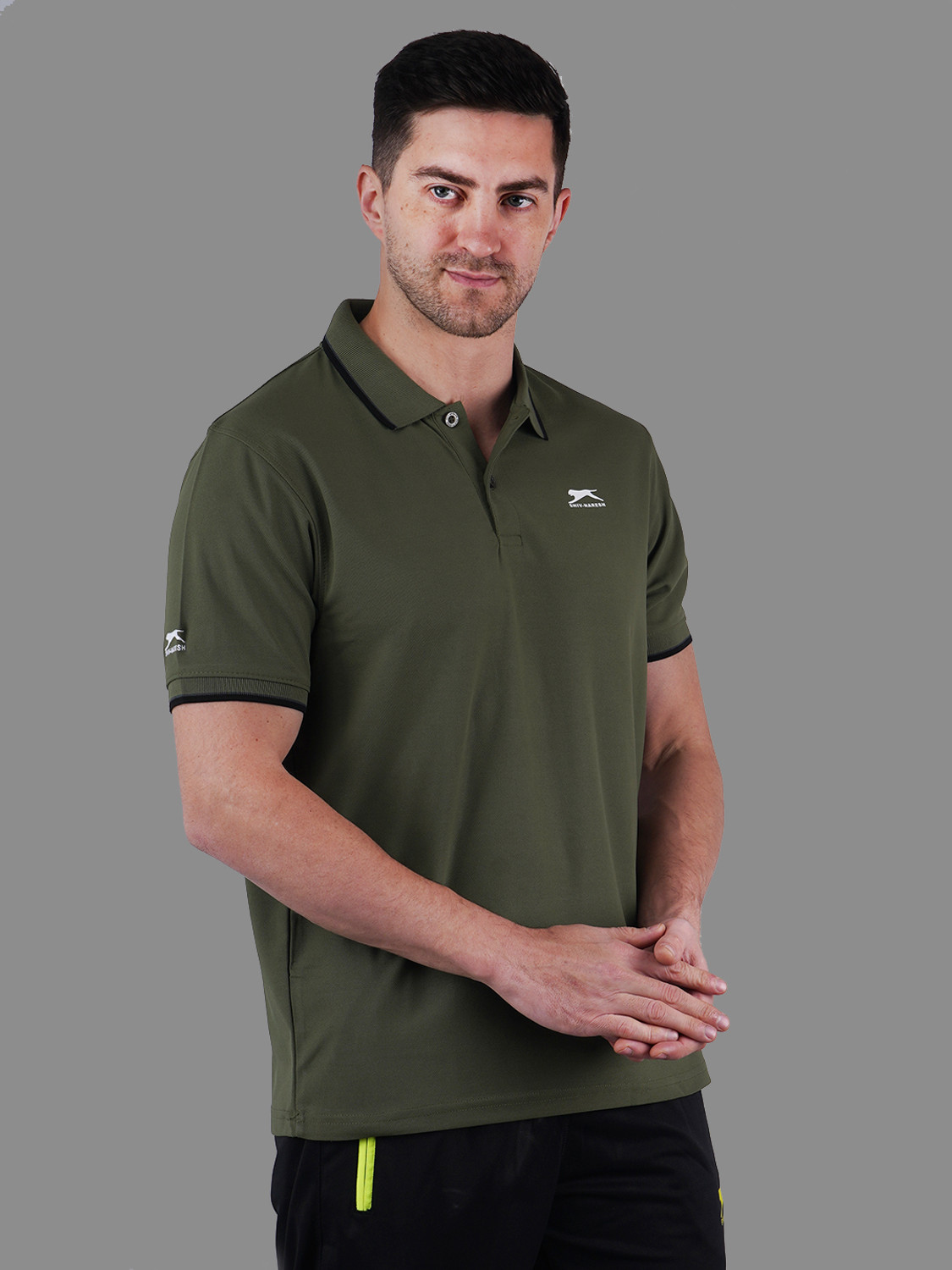 Image of Shiv Naresh Self Design Men Polo Neck Dark Green T-Shirt
