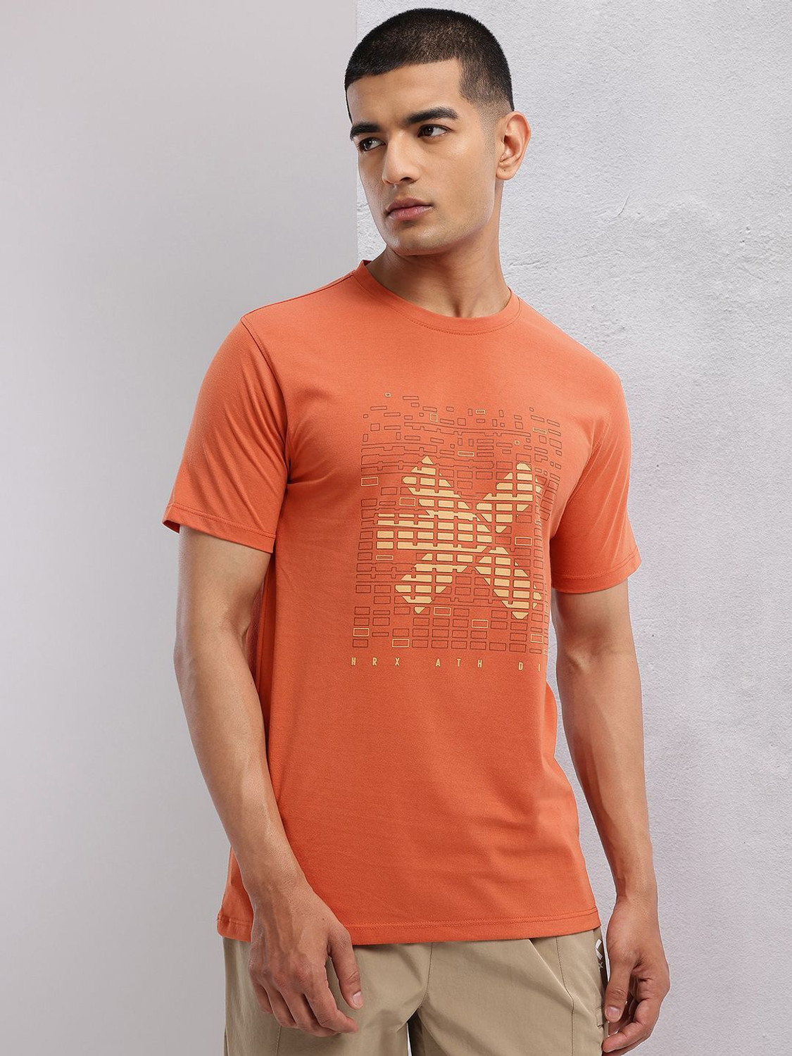 Image of HRX by Hrithik Roshan Printed Men Round Neck Orange T-Shirt