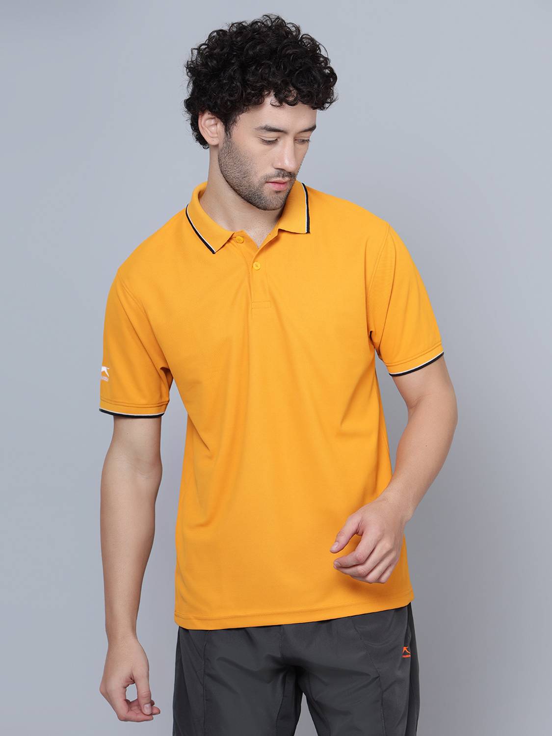 Shiv Naresh Men Solid Polo Neck Polyester Yellow T-Shirt