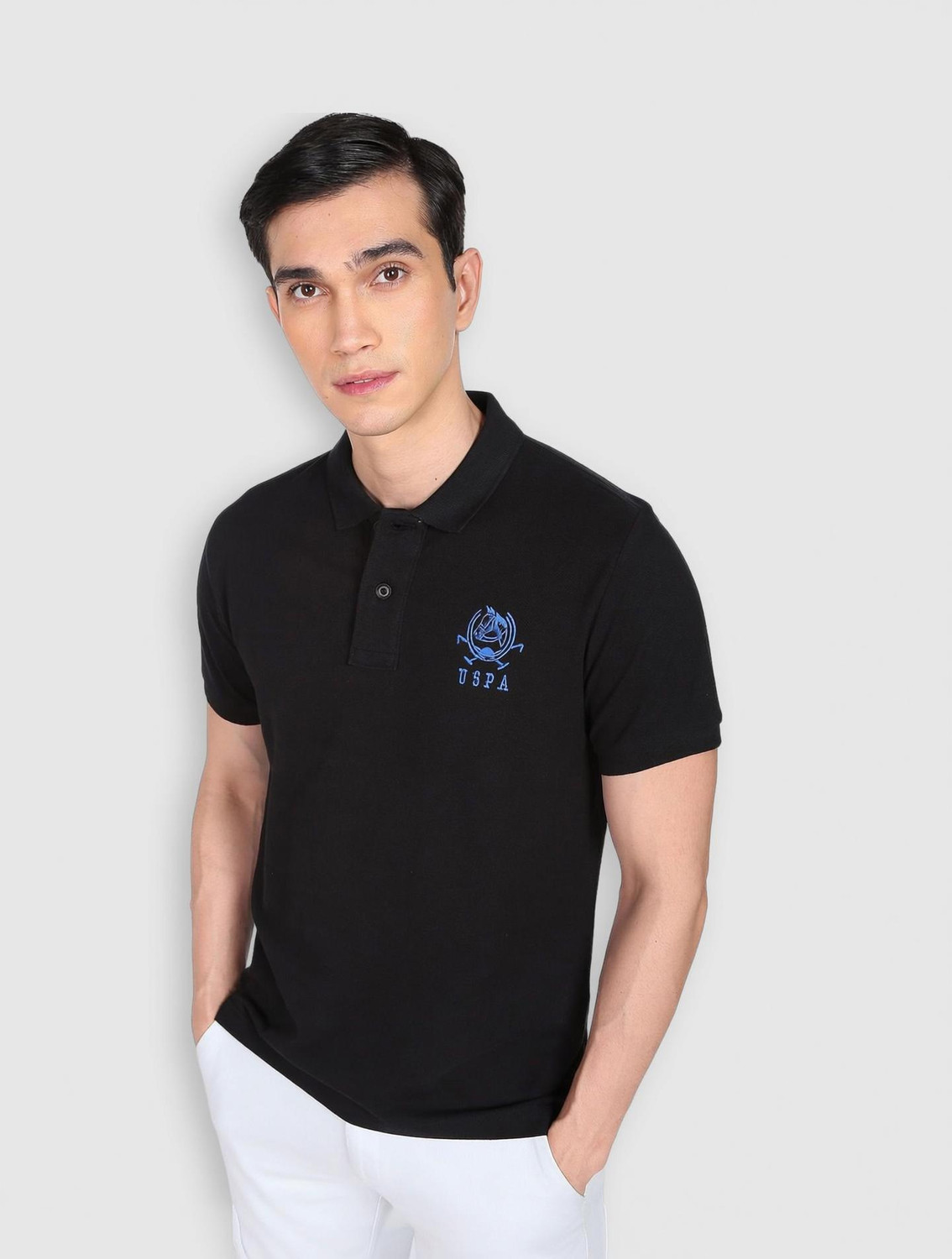 Image of U.S. POLO ASSN. Solid Men Polo Neck Black T-Shirt