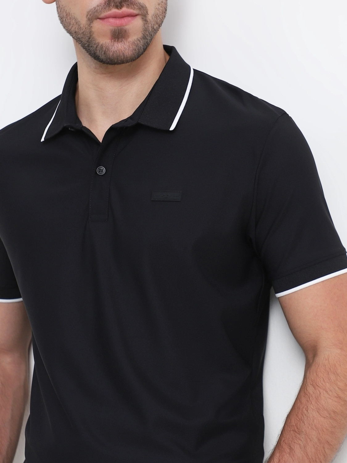Image of MUFTI Self Design Men Polo Neck Black T-Shirt
