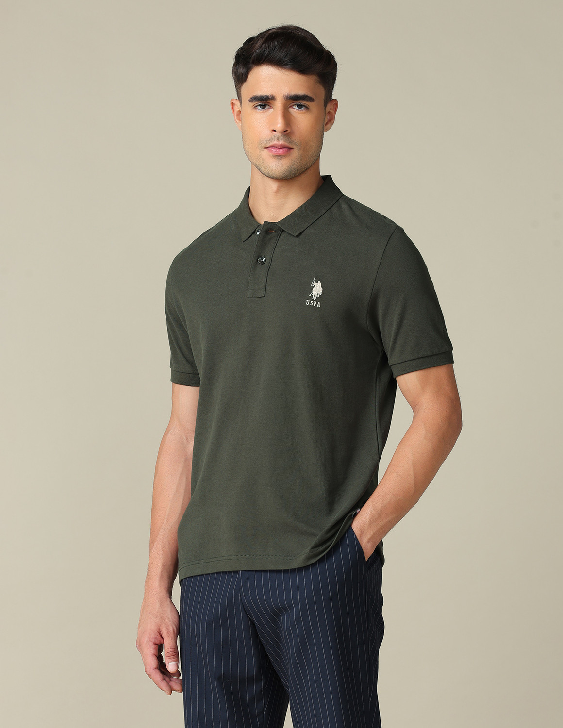 Image of U.S. Polo Assn. Denim Co. Solid Men Polo Neck Green T-Shirt