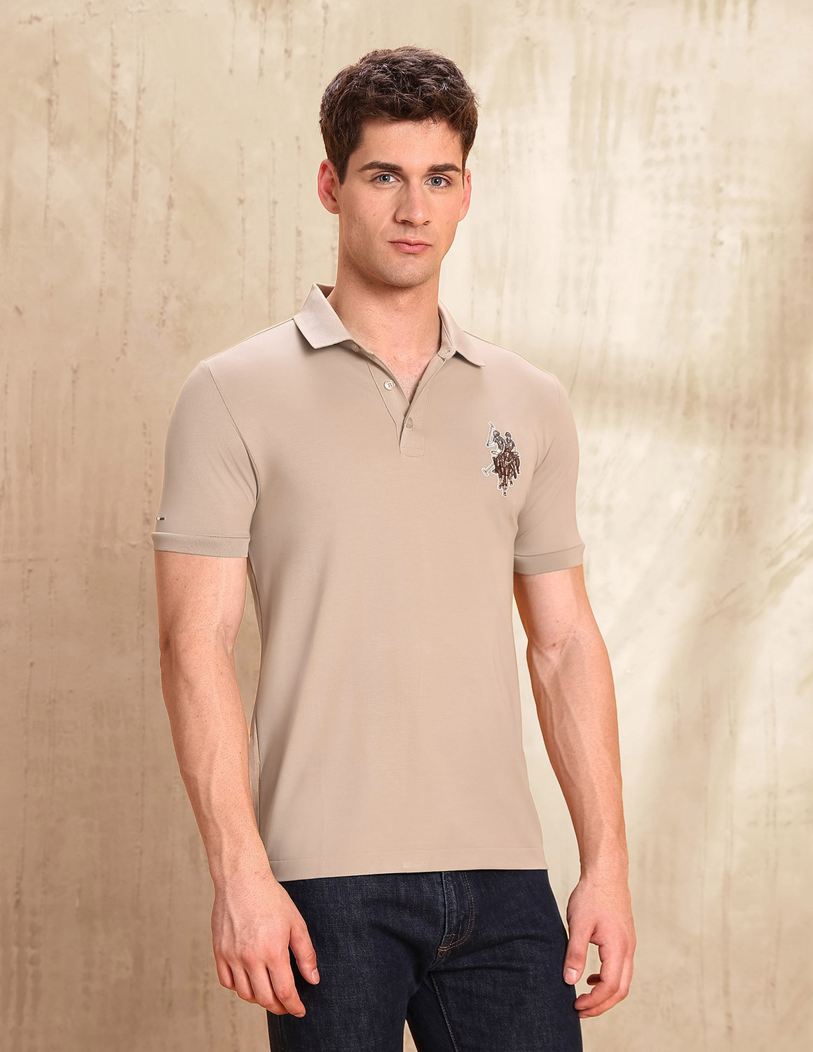 Image of U.S. Polo Assn. Denim Co. Solid Men Polo Neck Beige T-Shirt