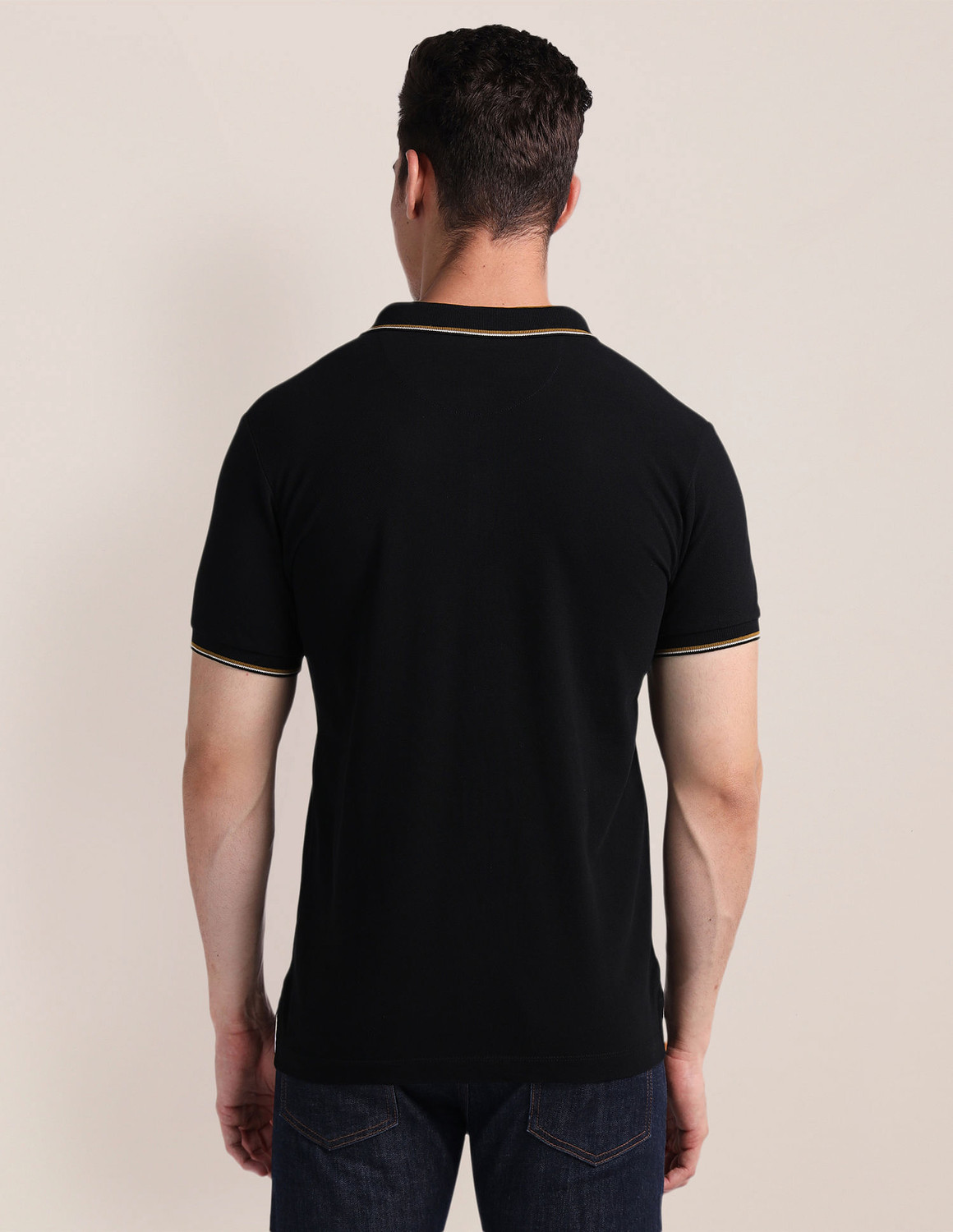 Image of U.S. POLO ASSN. Solid Men Polo Neck Black T-Shirt