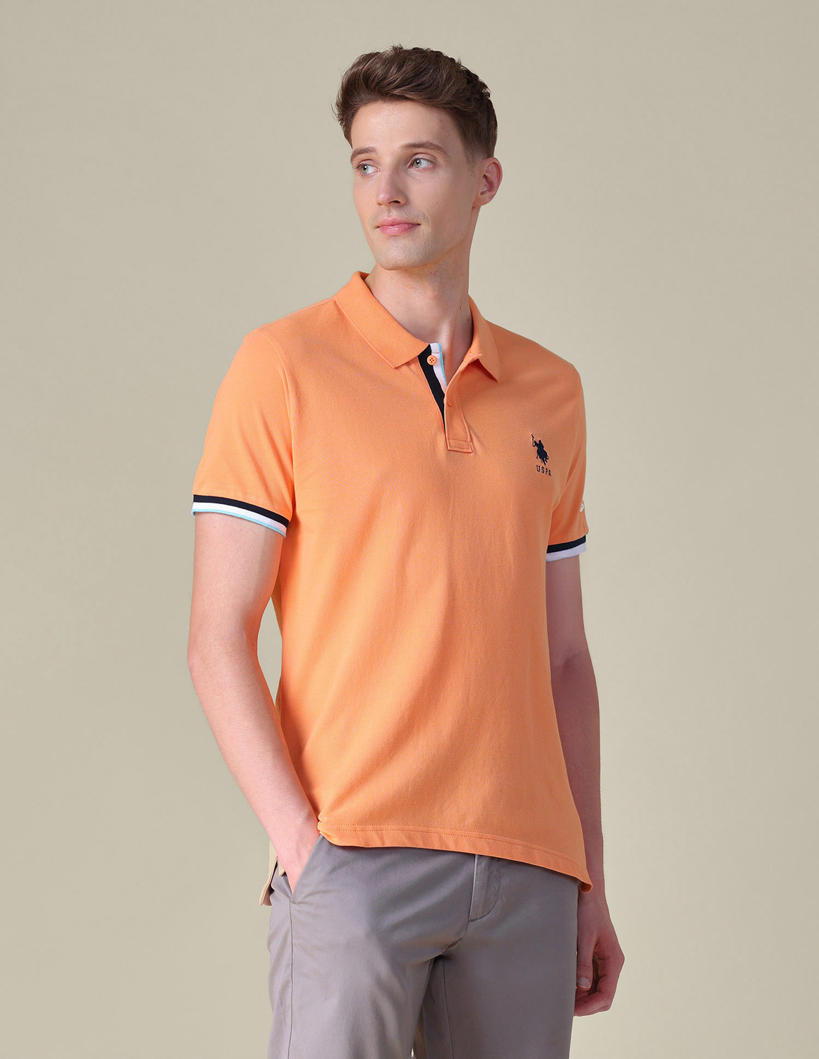 Image of U.S. POLO ASSN. Solid Men Polo Neck Orange T-Shirt
