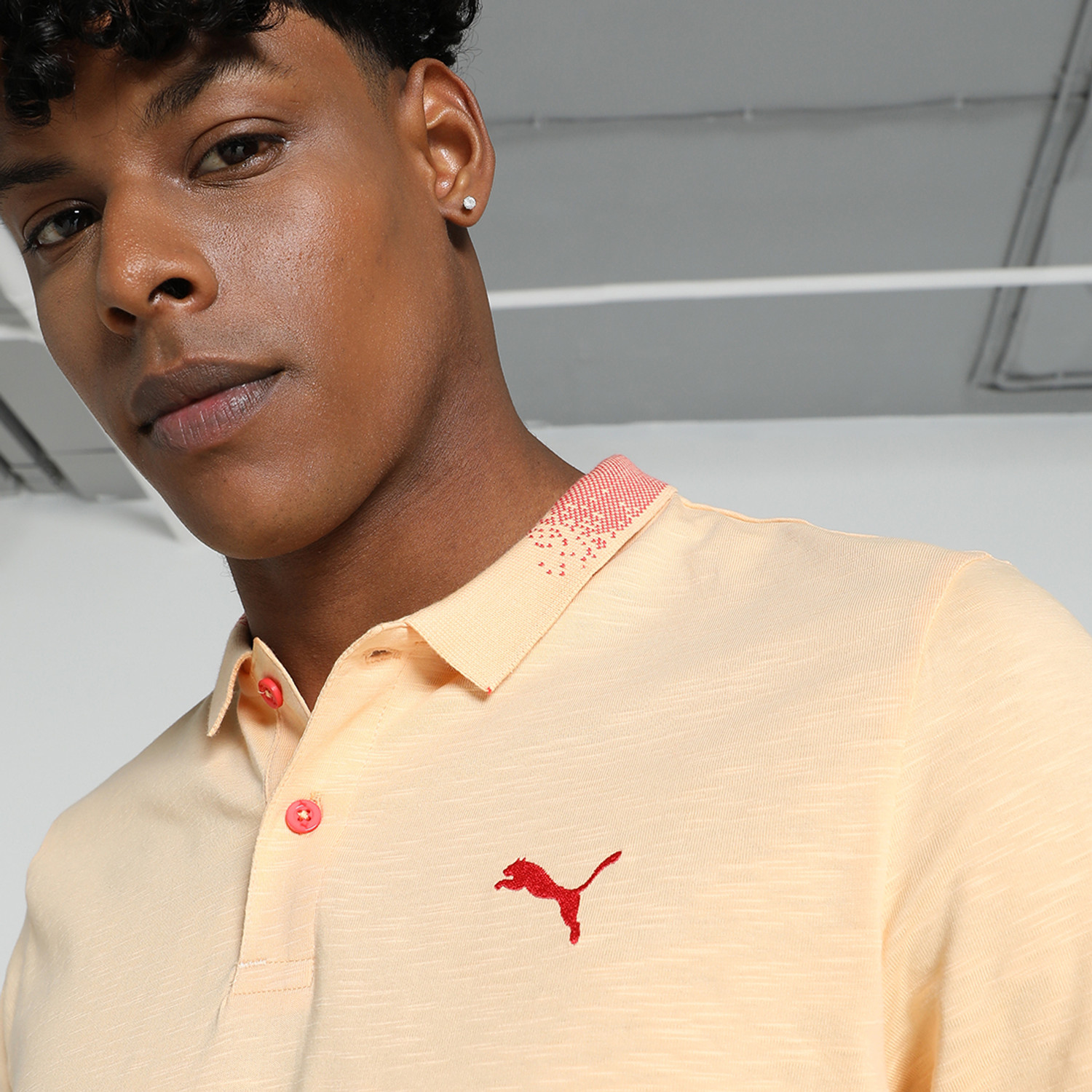 Image of PUMA Solid Men Polo Neck Orange T-Shirt