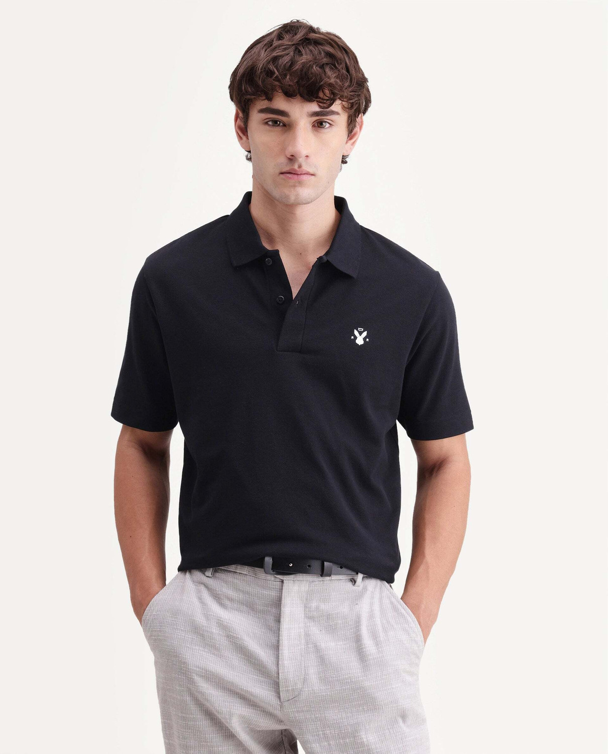 Image of RARE RABBIT Solid Men Polo Neck Black T-Shirt