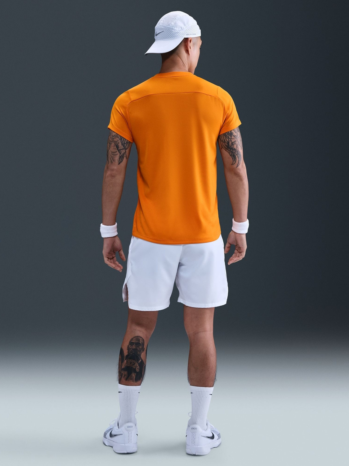 Image of NIKE Solid Men Round Neck Orange T-Shirt