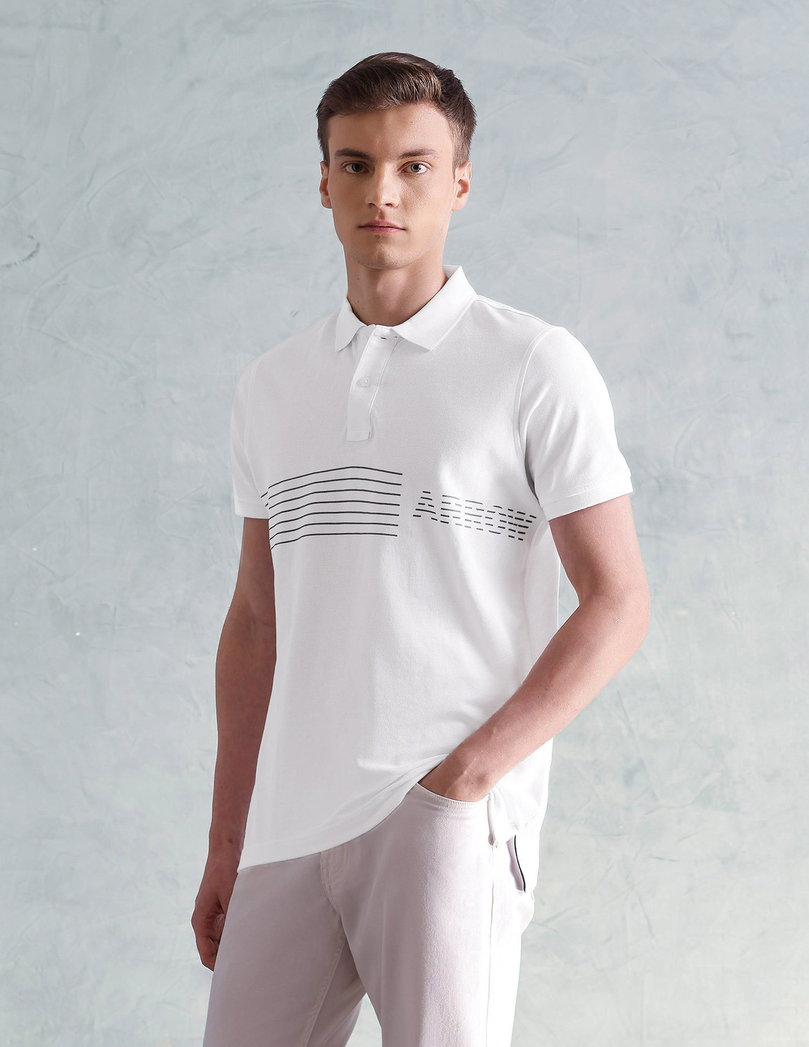 Image of Arrow Sport Men Striped Polo Neck Cotton Blend White T-Shirt