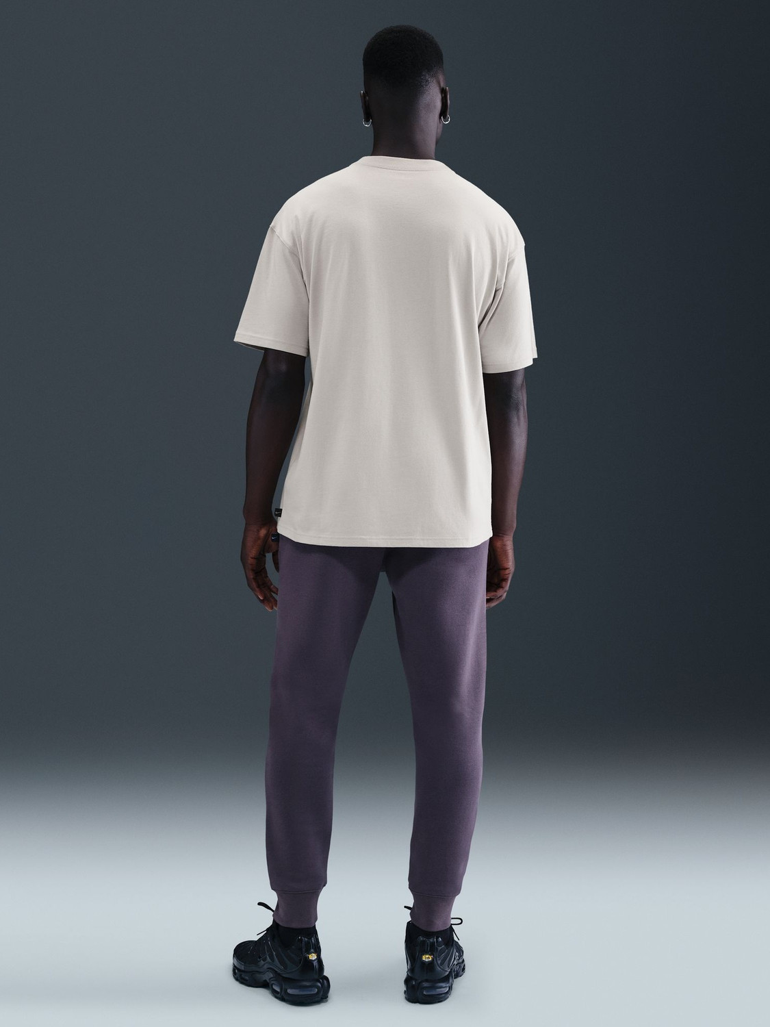 Image of NIKE Solid Men Round Neck Grey T-Shirt
