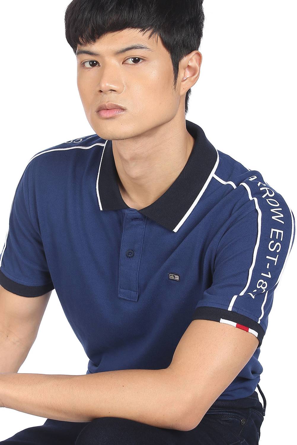 Arrow Sport Solid Men Polo Neck Blue T-Shirt