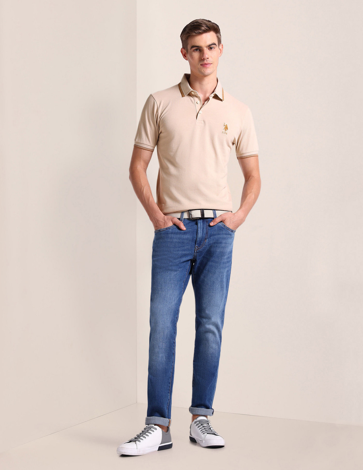 Image of U.S. POLO ASSN. Men Solid Polo Neck Cotton Blend Beige T-Shirt