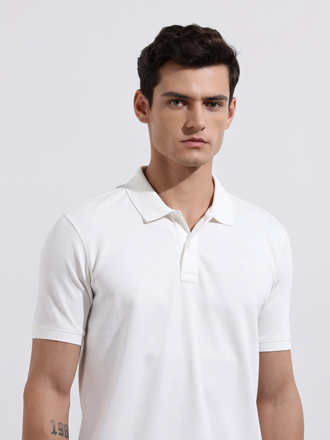 Image of The Indian Garage Co. Solid Men Polo Neck White T-Shirt