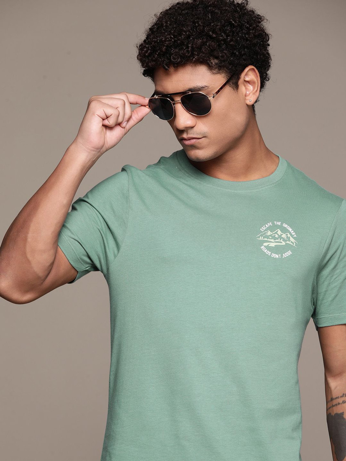 Image of Roadster Solid Men Round Neck Green T-Shirt