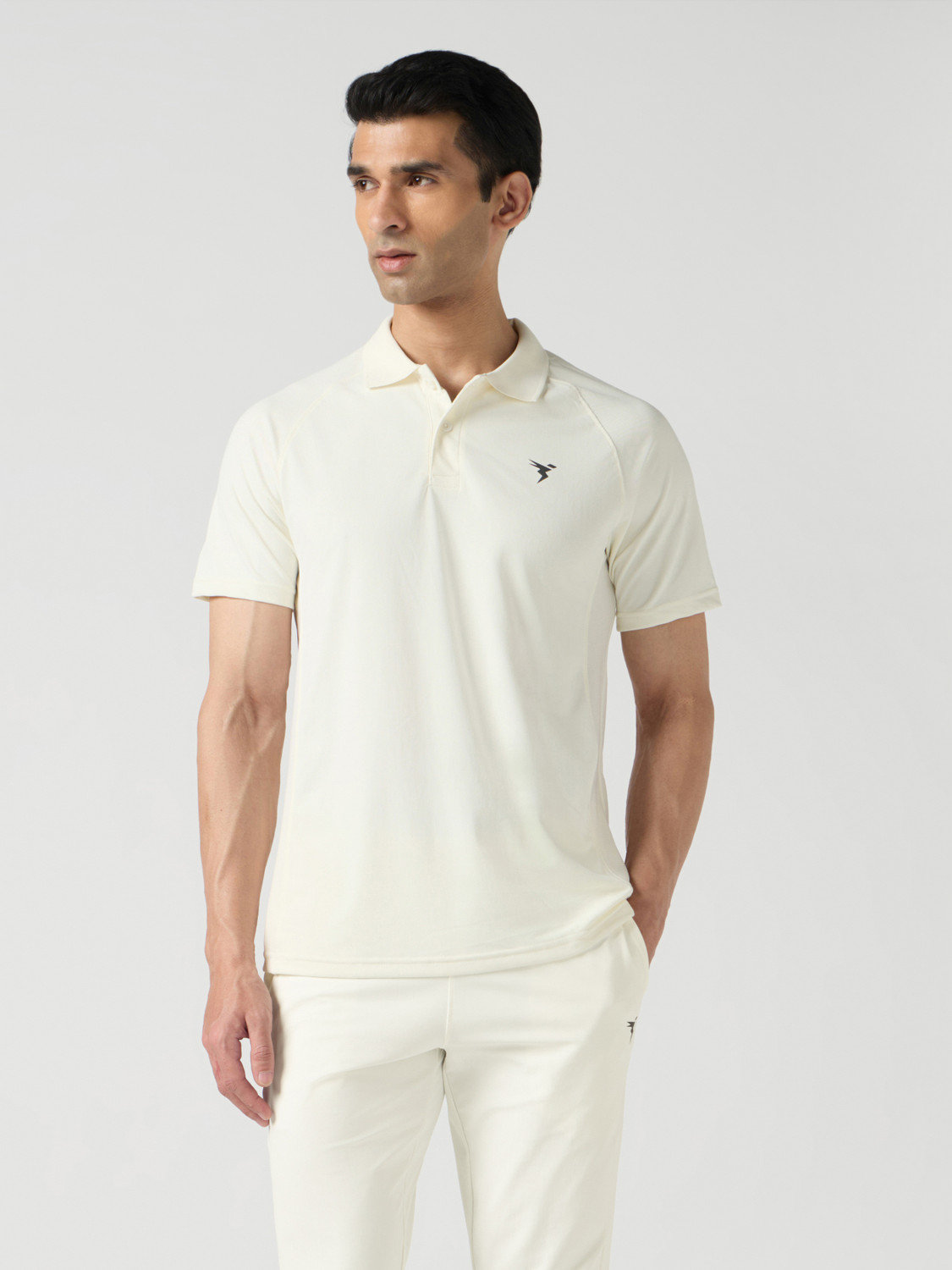Image of TECHNOSPORT Solid Men Polo Neck White T-Shirt