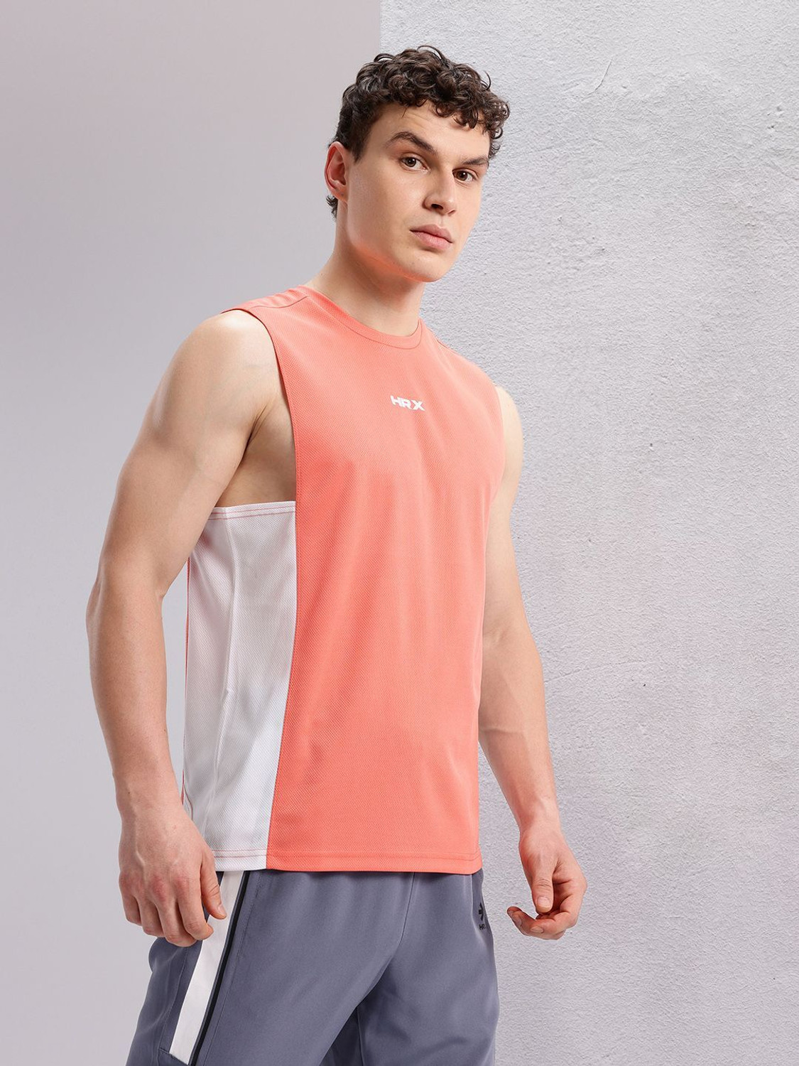 Image of HRX by Hrithik Roshan Printed Men Round Neck Orange T-Shirt