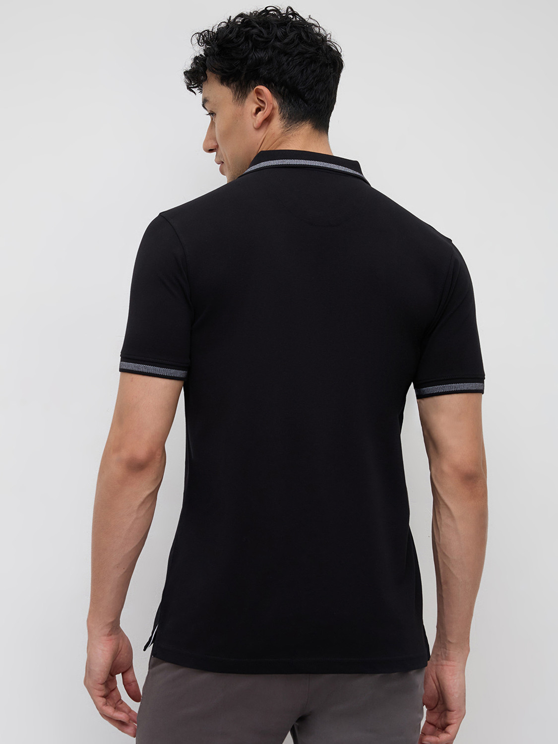 Image of PARK AVENUE Solid Men Polo Neck Black T-Shirt