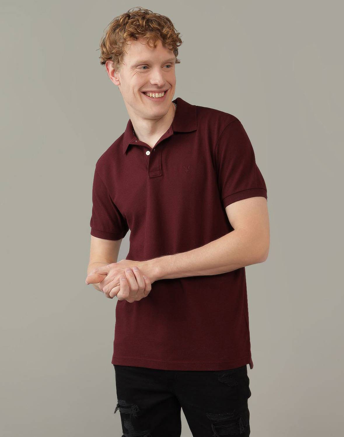 American Eagle Solid Men Polo Neck Maroon T-Shirt