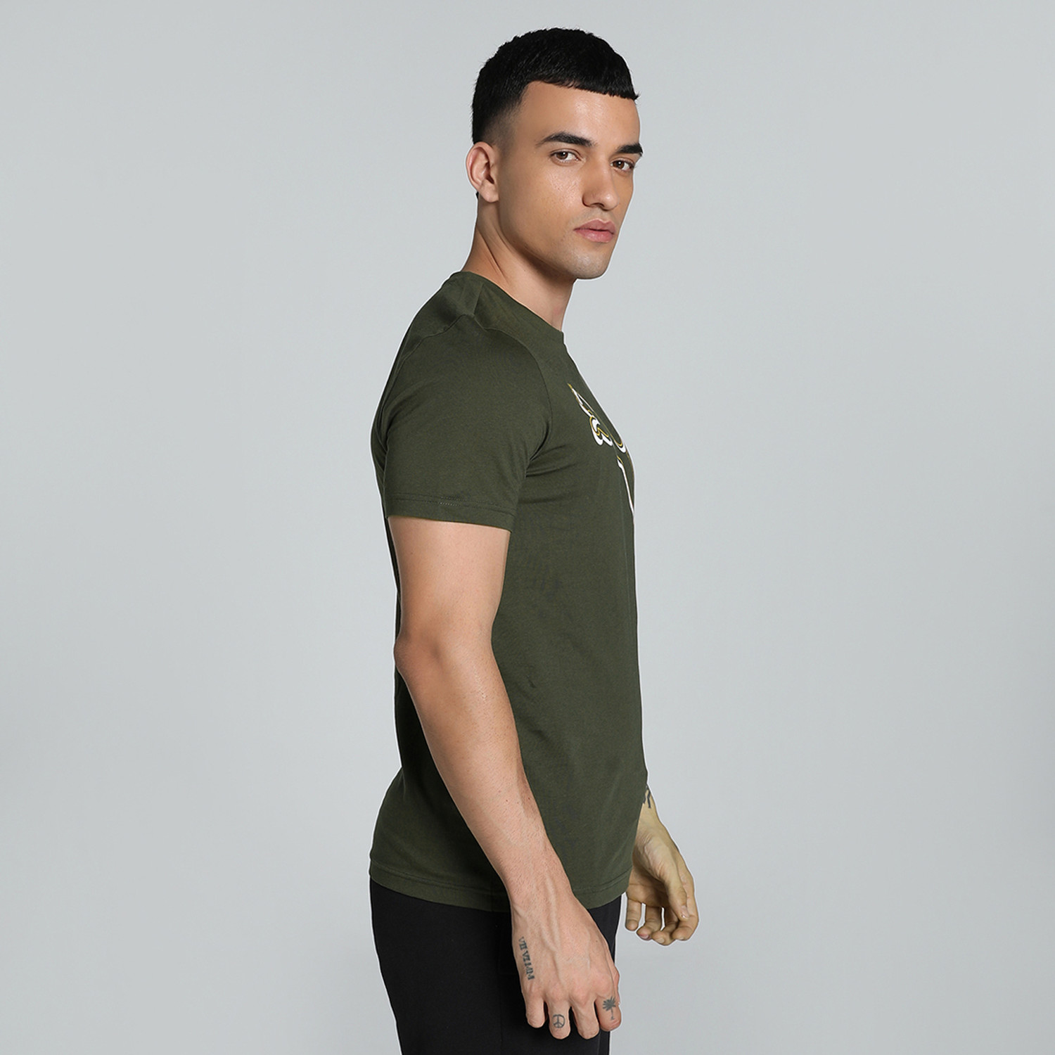 Image of PUMA Solid Men Crew Neck Green T-Shirt