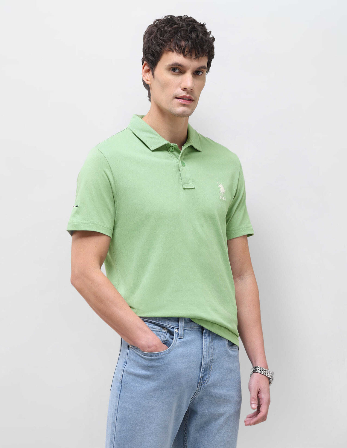 Image of U.S. Polo Assn. Denim Co. Solid Men Polo Neck Green T-Shirt