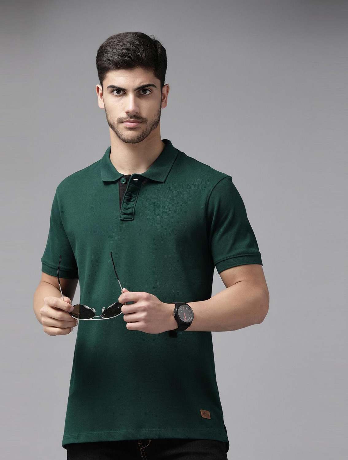 Image of Roadster Solid Men Polo Neck Green T-Shirt