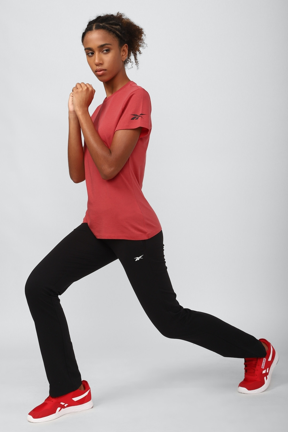 Image of REEBOK Solid Women Round Neck Red T-Shirt