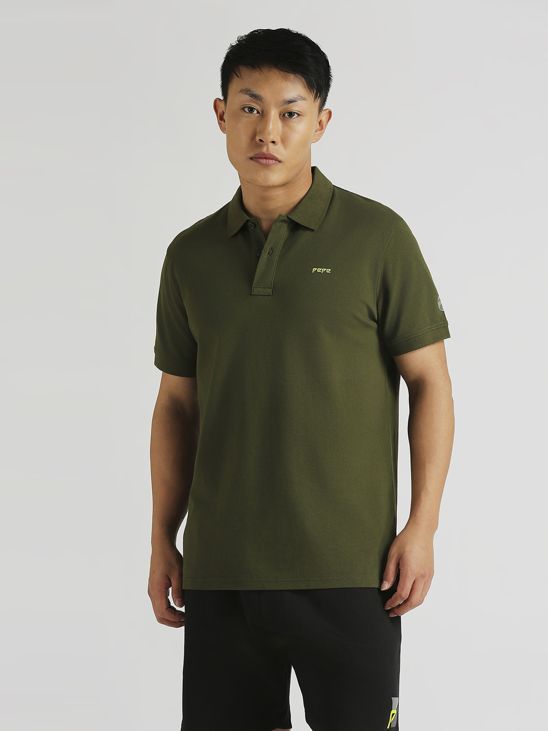 Image of Pepe Jeans Solid Men Polo Neck Green T-Shirt