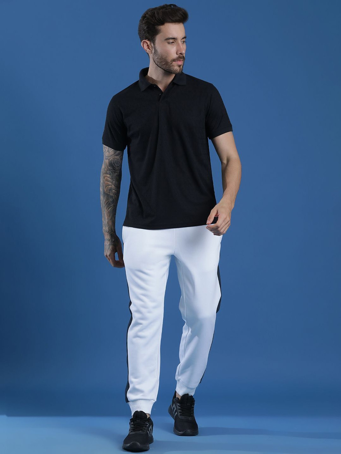 Image of EPPE Solid Men Polo Neck Black T-Shirt