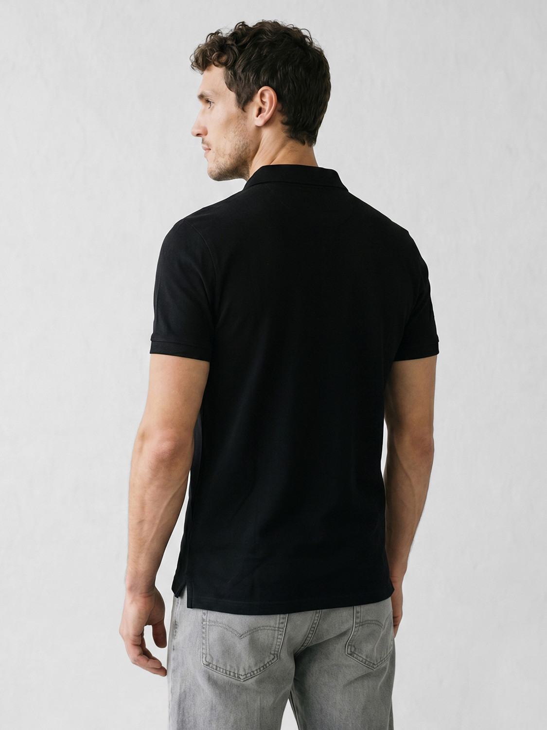 Image of WROGN Solid Men Polo Neck Black T-Shirt