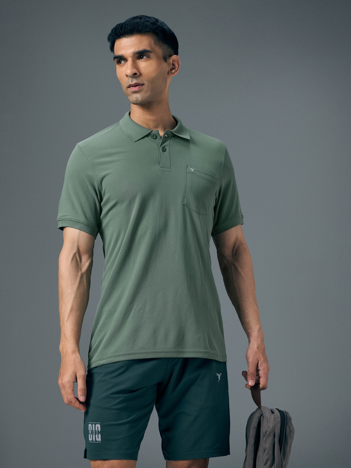 Image of TECHNOSPORT Solid Men Polo Neck Green T-Shirt