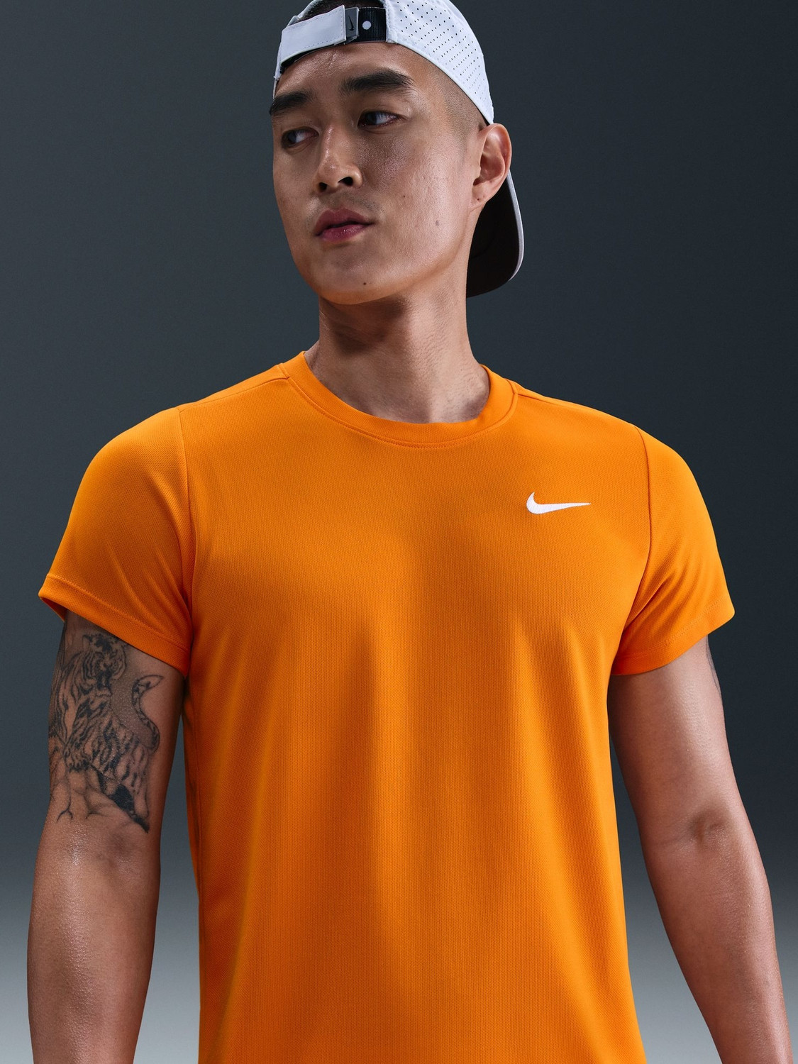 Image of NIKE Solid Men Round Neck Orange T-Shirt