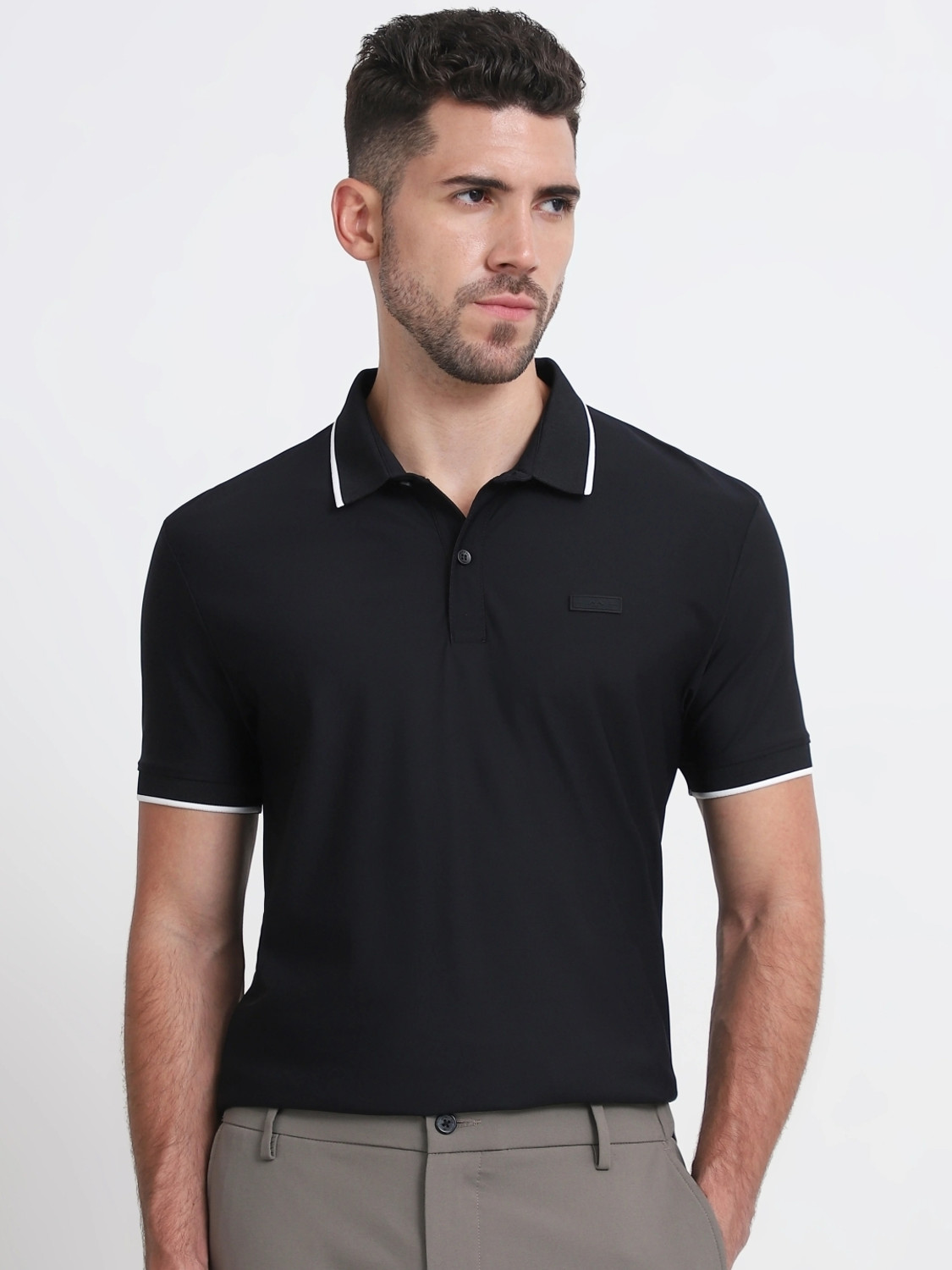 Image of MUFTI Self Design Men Polo Neck Black T-Shirt