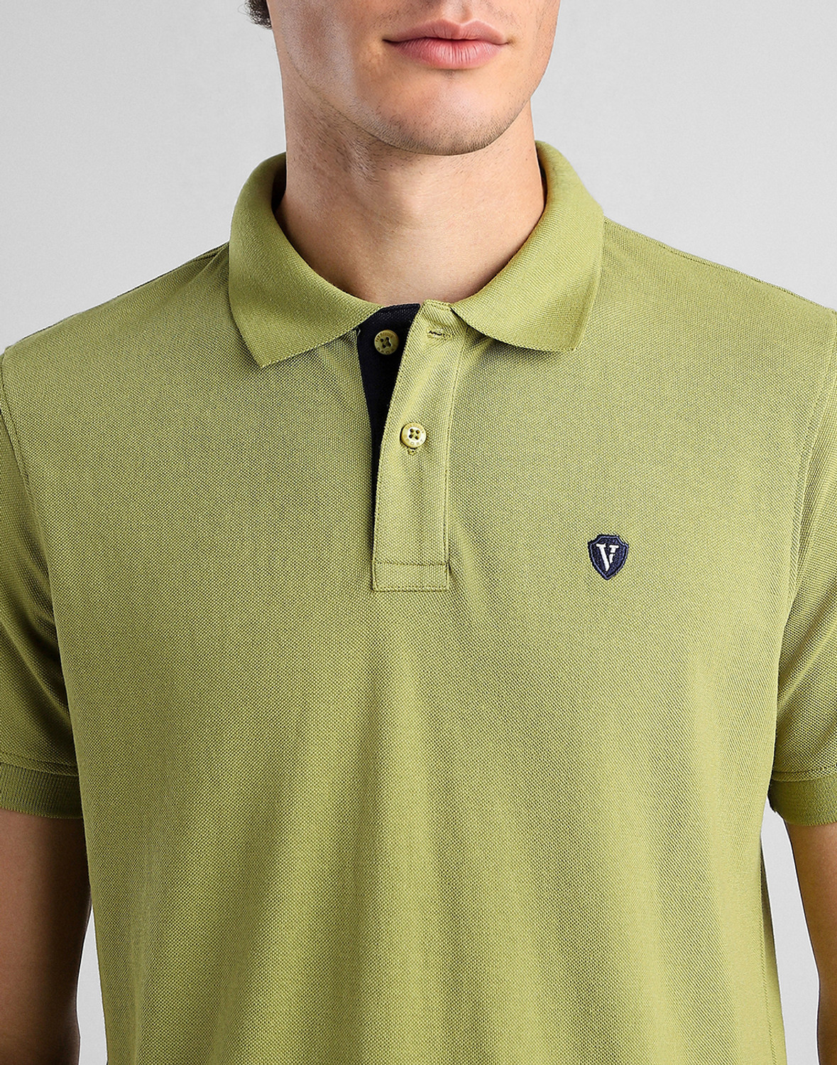 Image of VAN HEUSEN SPORT Men Solid Polo Neck Polycotton Green T-Shirt