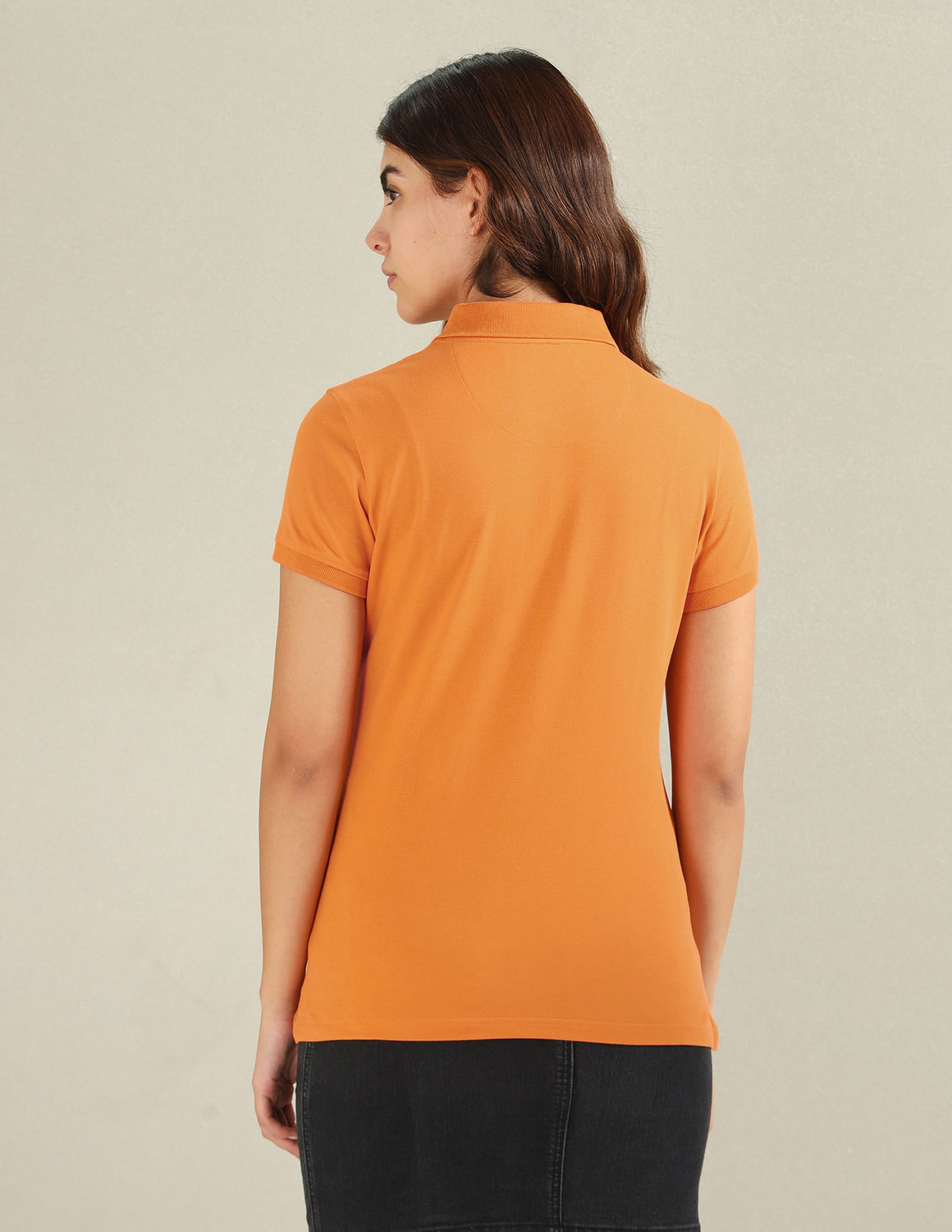 Image of U.S. POLO ASSN. Solid Women Polo Neck Yellow T-Shirt
