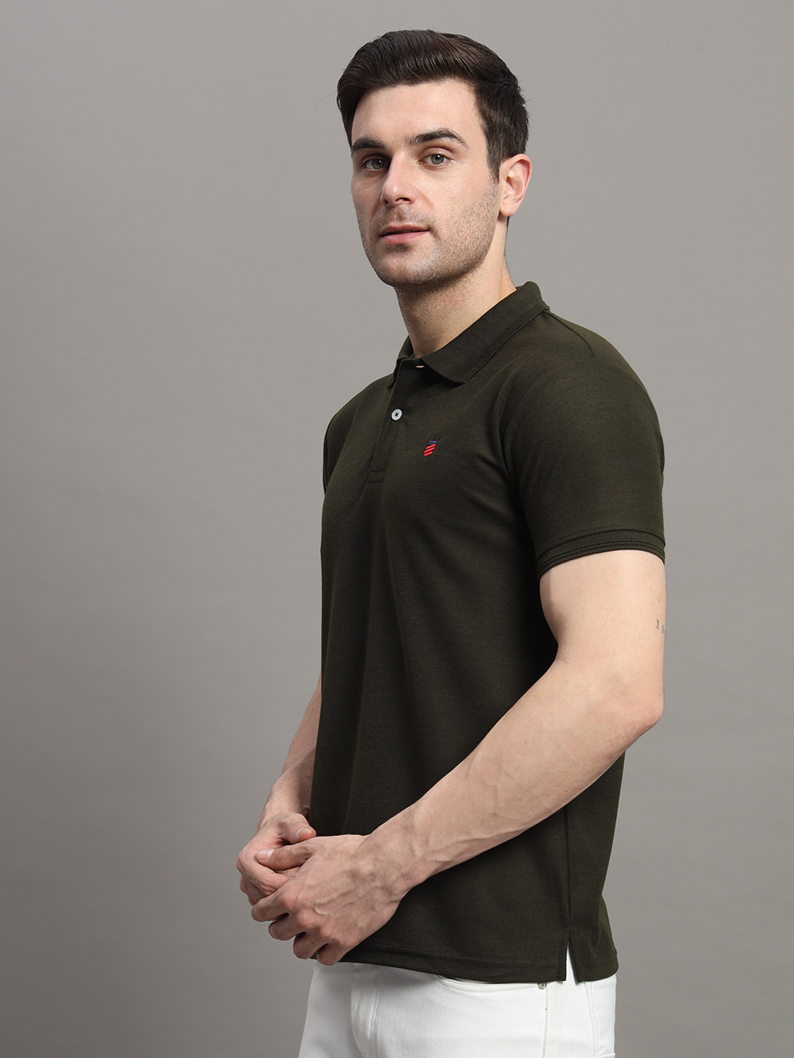 Image of RARHANPREMIUM Solid Men Polo Neck Dark Green T-Shirt
