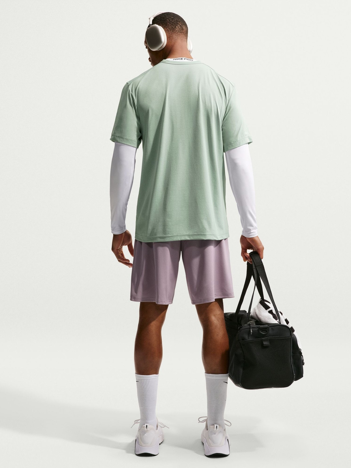 Image of NIKE Solid Men Crew Neck Light Green T-Shirt