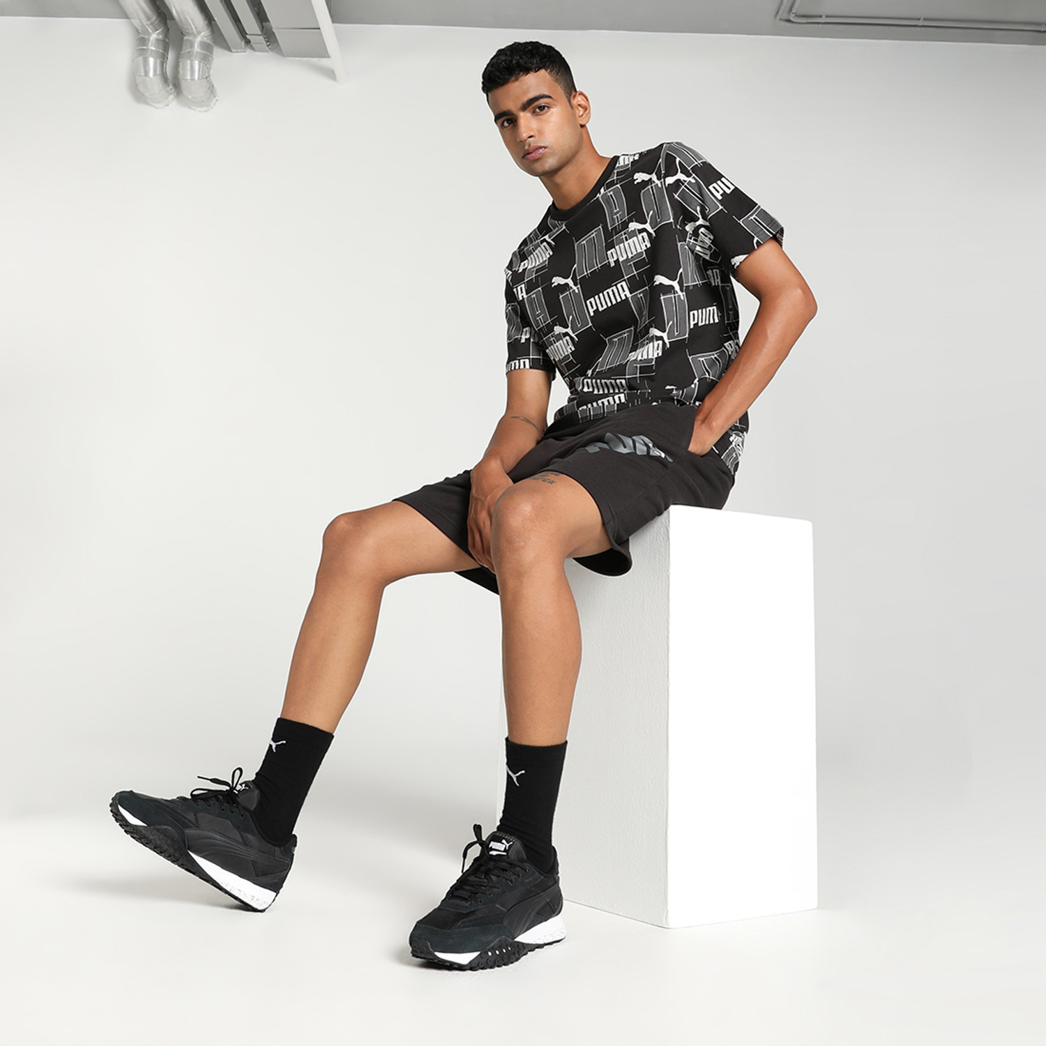 Image of PUMA Printed Men Crew Neck Black T-Shirt