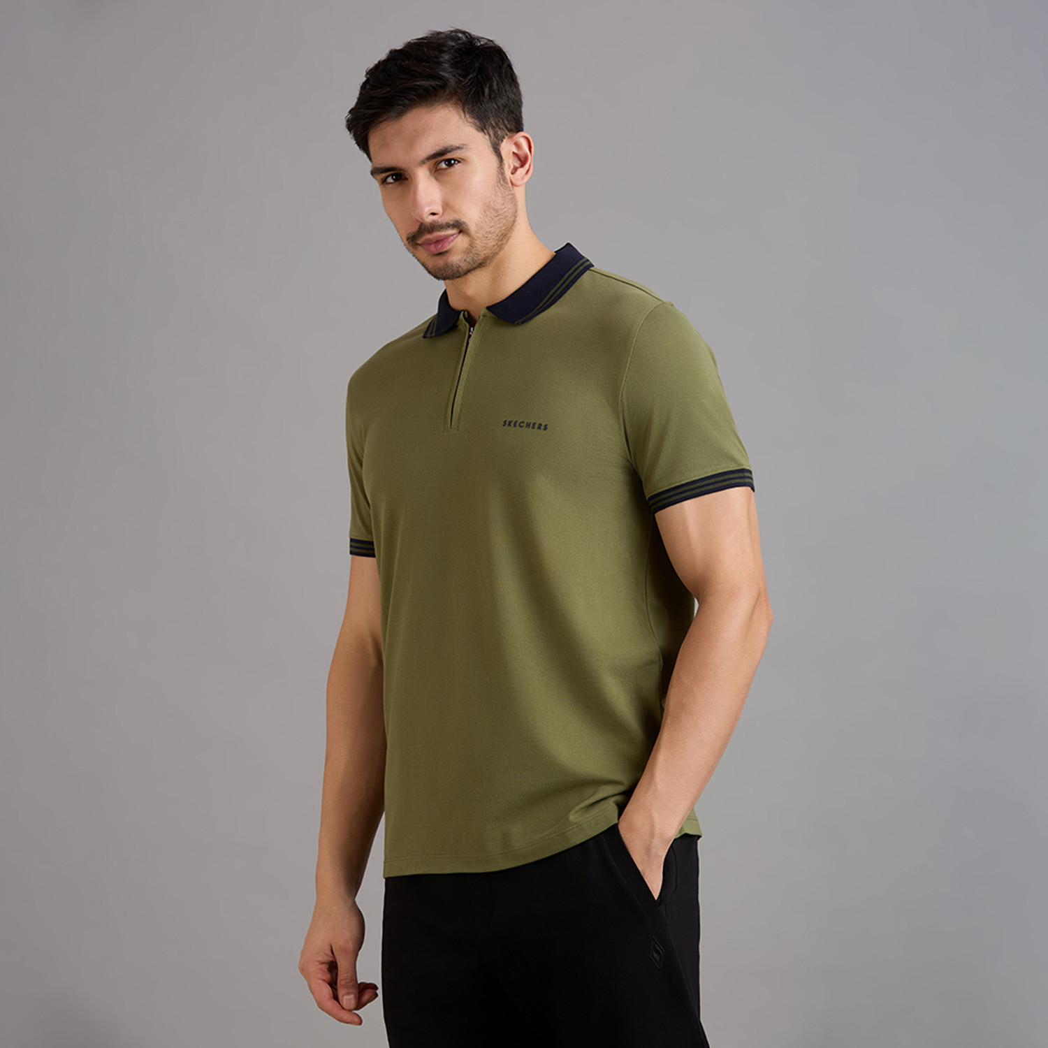 Image of Skechers Solid Men Polo Neck Green T-Shirt