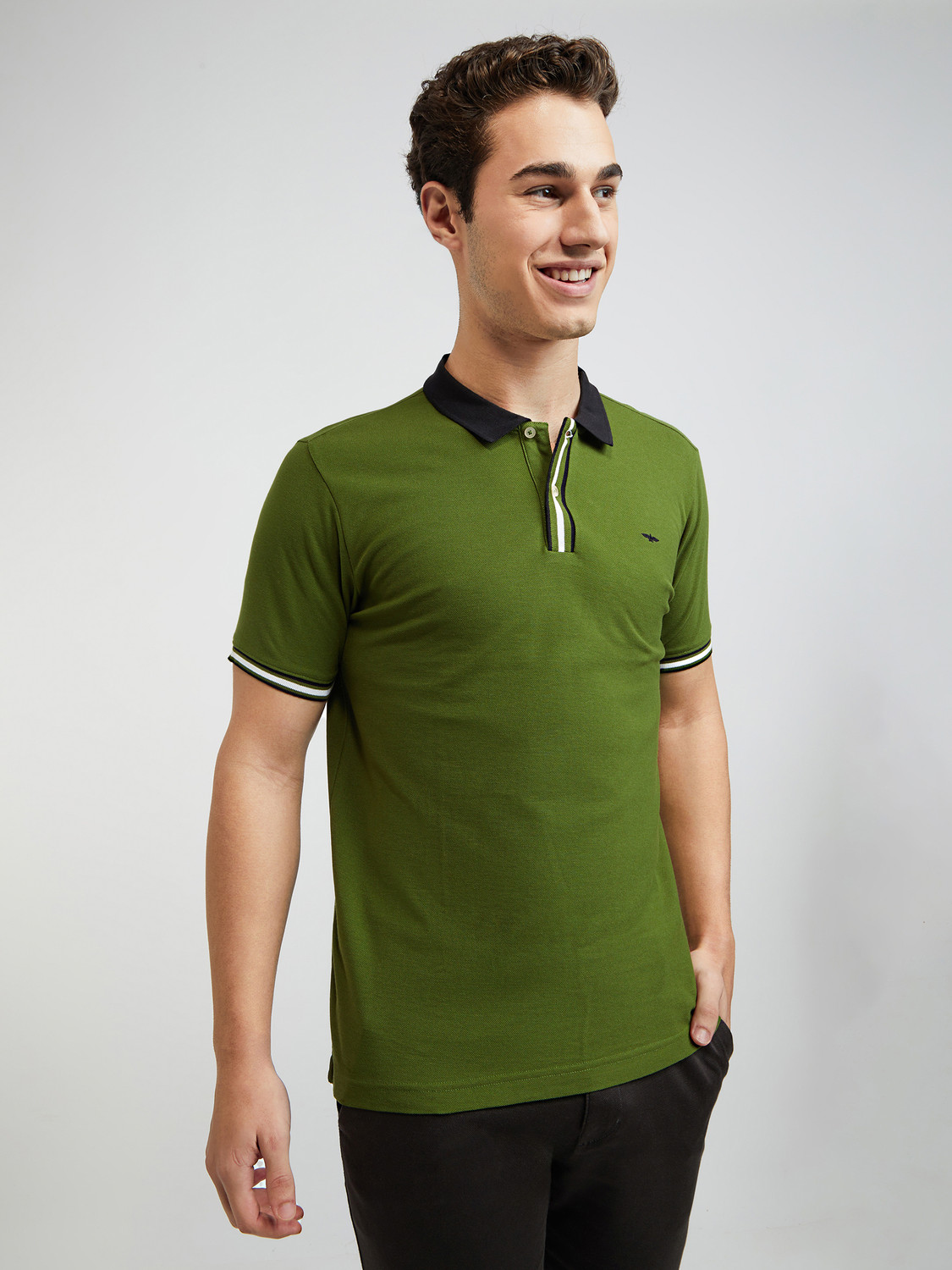 Image of PARK AVENUE Men Solid Polo Neck Cotton Blend Dark Green T-Shirt