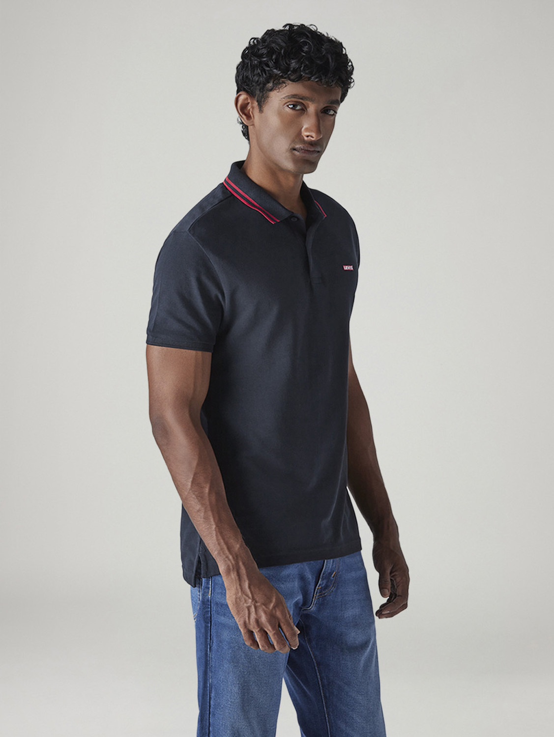 Image of LEVI'S Solid Men Polo Neck Dark Blue T-Shirt