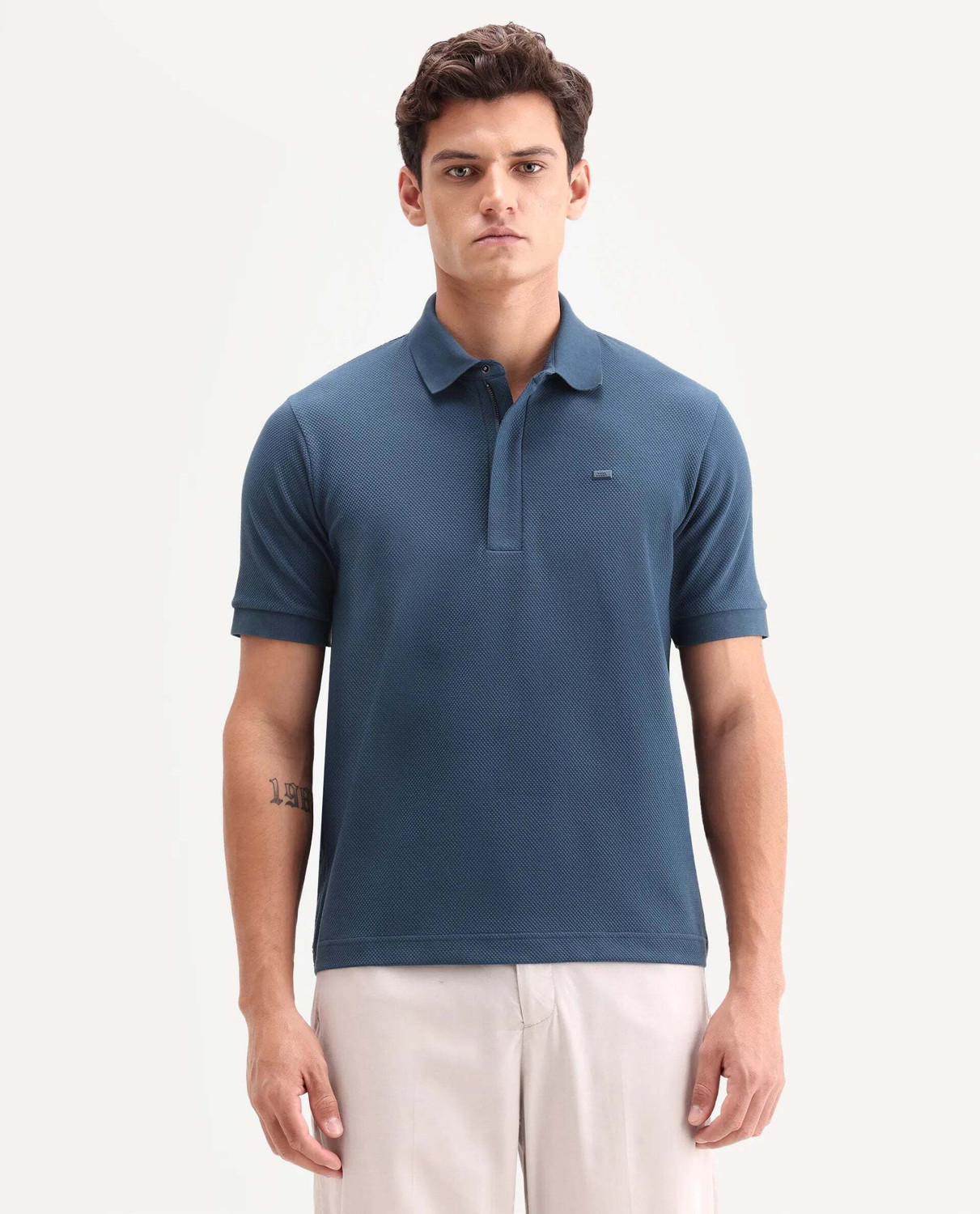 Image of RARE RABBIT Solid Men Polo Neck Blue T-Shirt