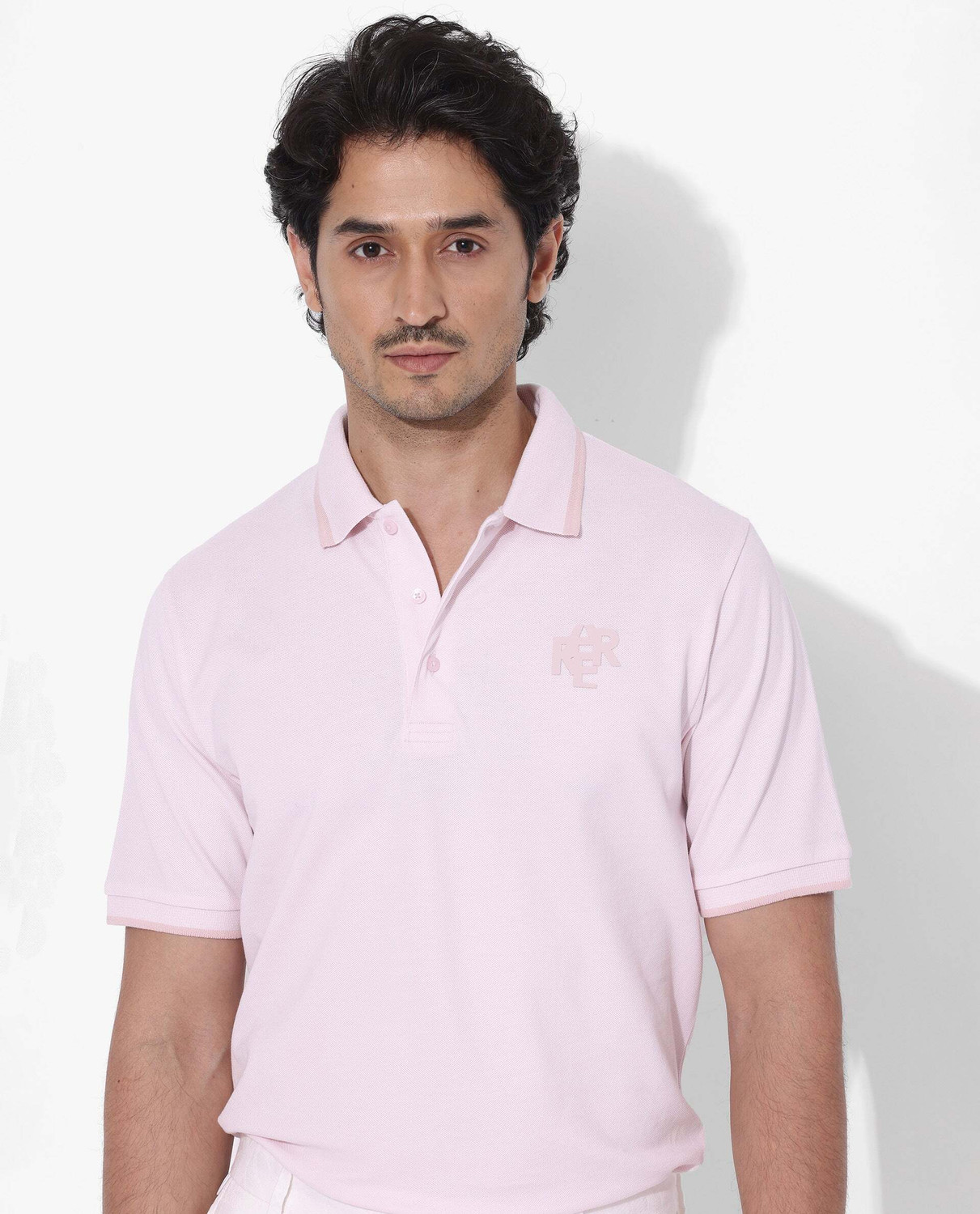 Image of RARE RABBIT Solid Men Polo Neck Pink T-Shirt