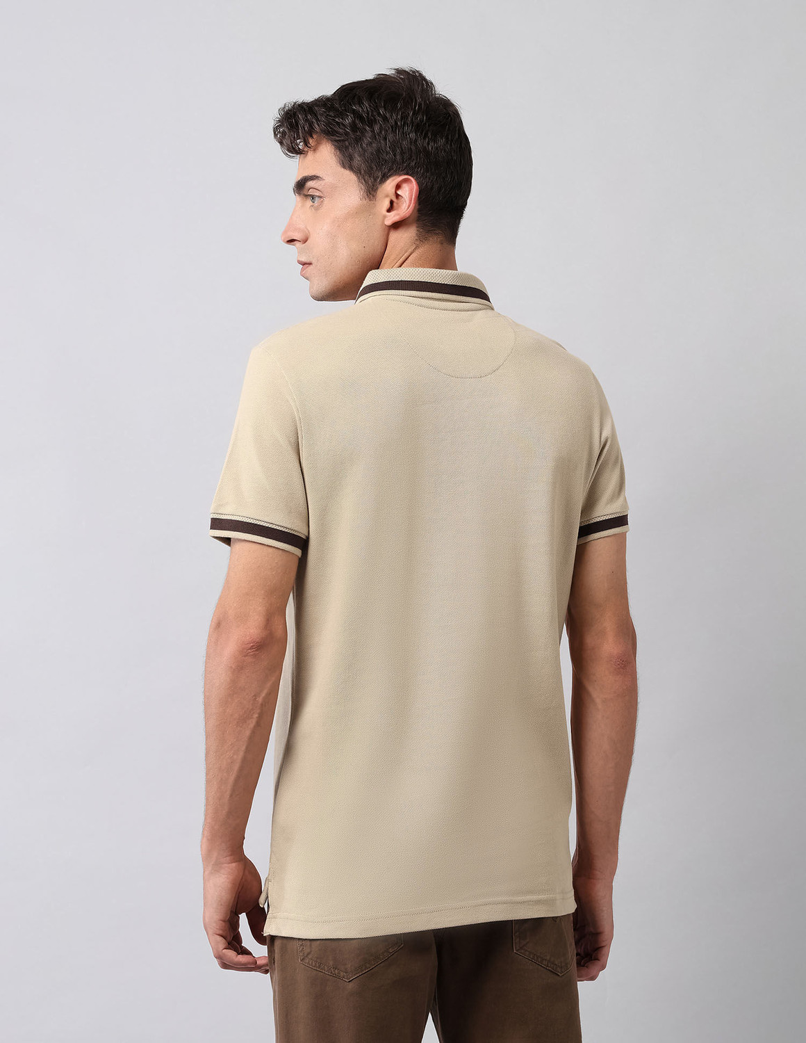 Image of U.S. Polo Assn. Denim Co. Solid Men Polo Neck Beige T-Shirt