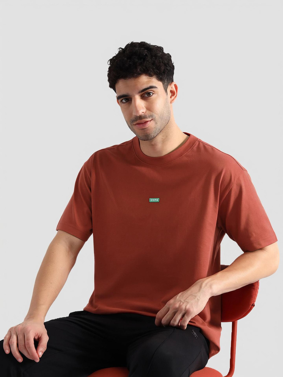 Image of U.S. POLO ASSN. Solid Men Crew Neck Orange T-Shirt