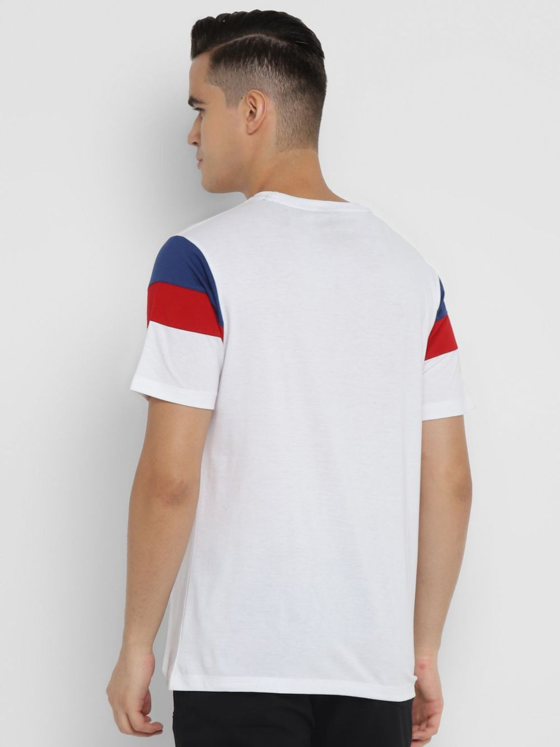 Image of HRX by Hrithik Roshan Solid Men Round Neck White T-Shirt