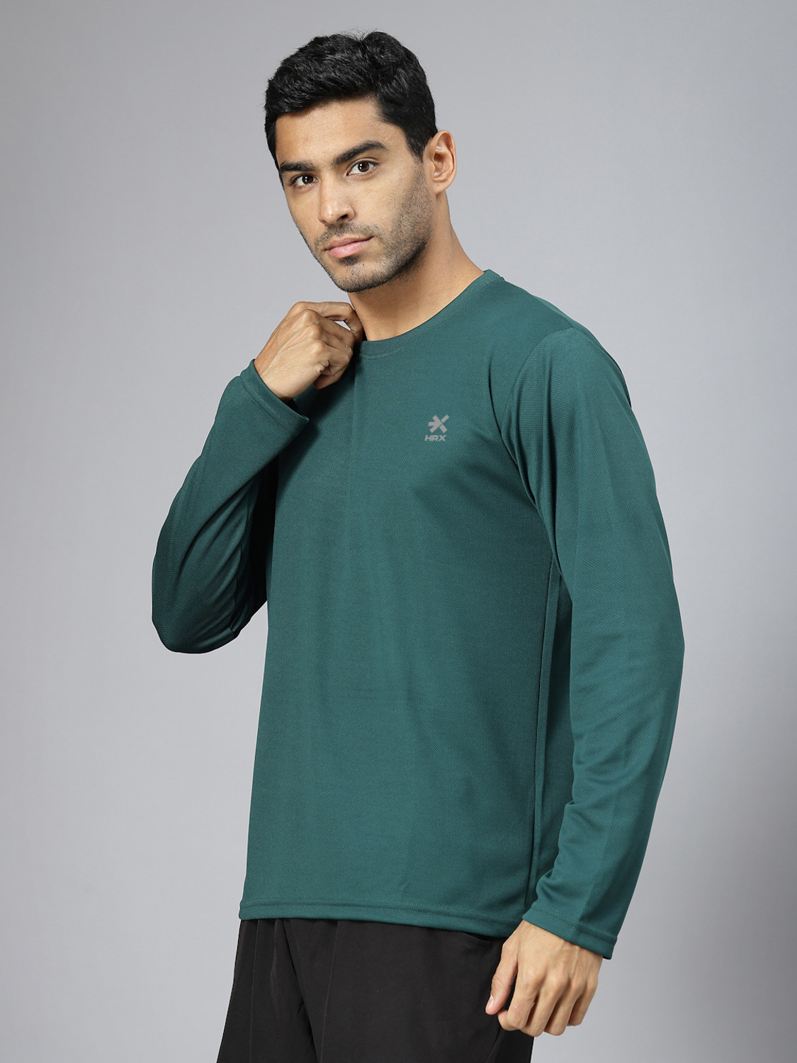 Image of HRX by Hrithik Roshan Solid Men Round Neck Green T-Shirt
