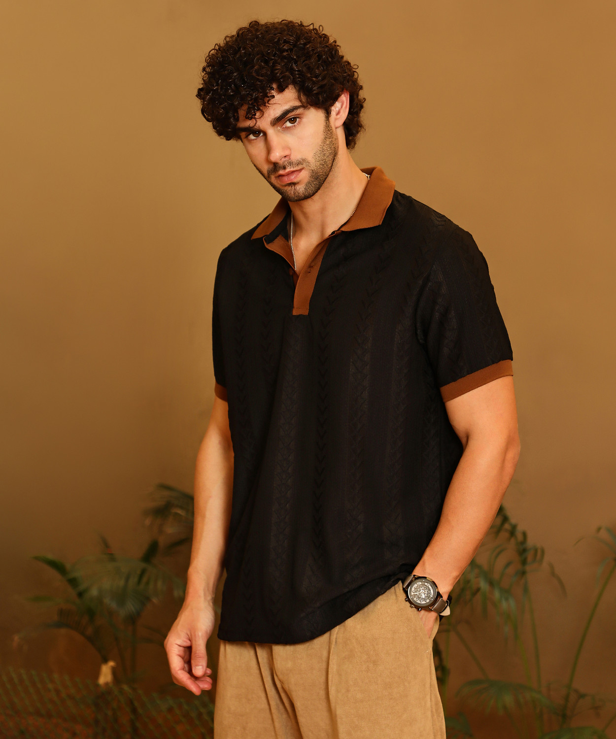 Image of CAMPUS SUTRA Solid Men Polo Neck Black T-Shirt
