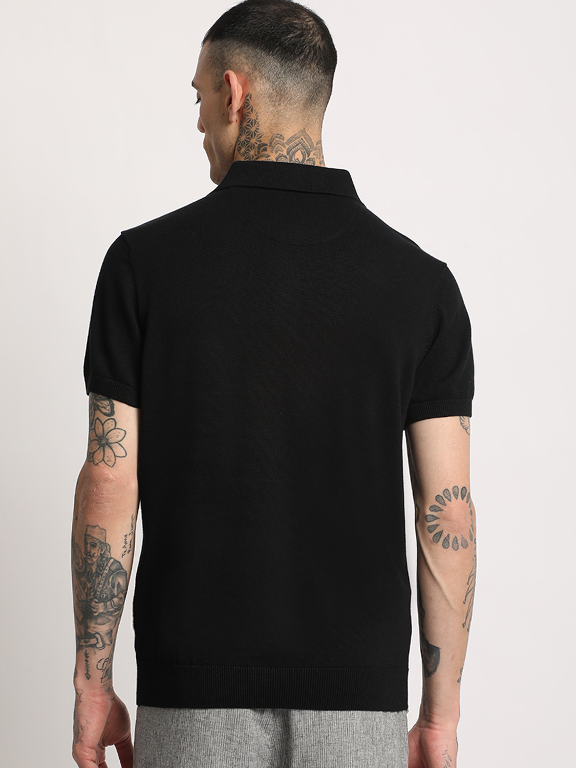 Image of THE BEAR HOUSE Solid Men Polo Neck Black T-Shirt