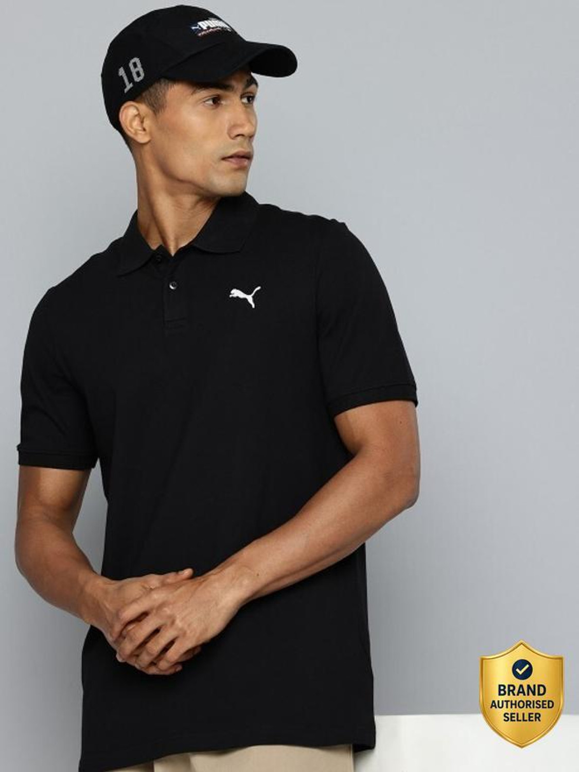 Image of PUMA Solid Men Polo Neck Black T-Shirt