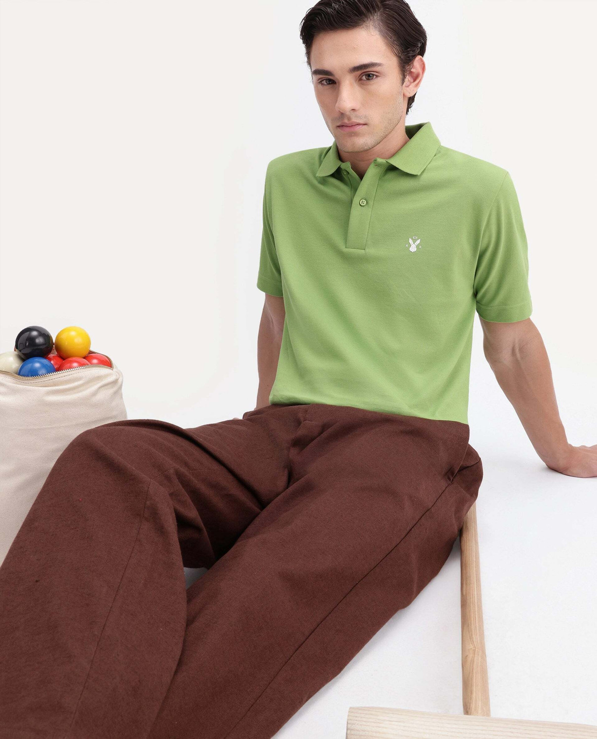 Image of RARE RABBIT Solid Men Polo Neck Green T-Shirt